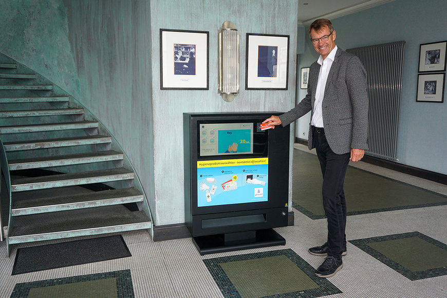 Praktischer Hygieneautomat für den Empfangsbereich in Unternehmen